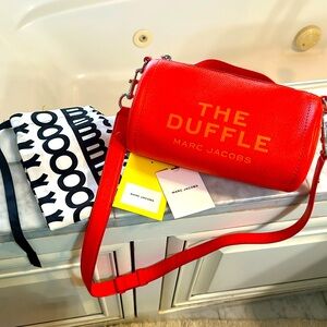 Marc Jacobs- orange duffle bag- with tags and dustbag